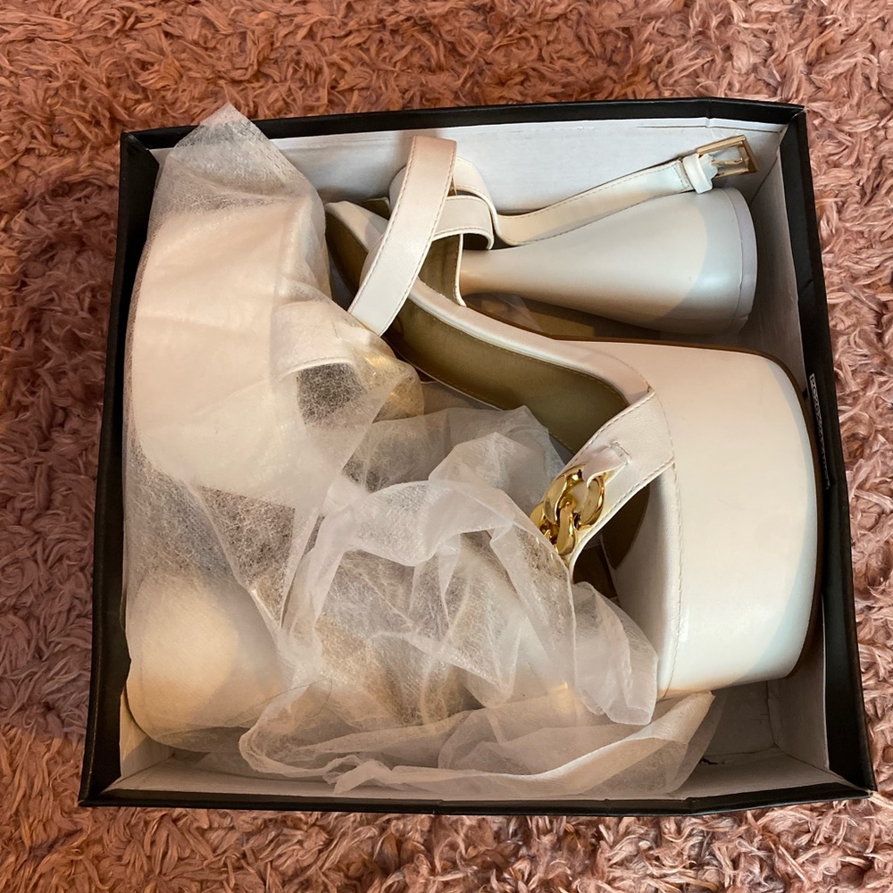 new EGO shoes white ankle wrap around with gold chain and sculpted platform heel